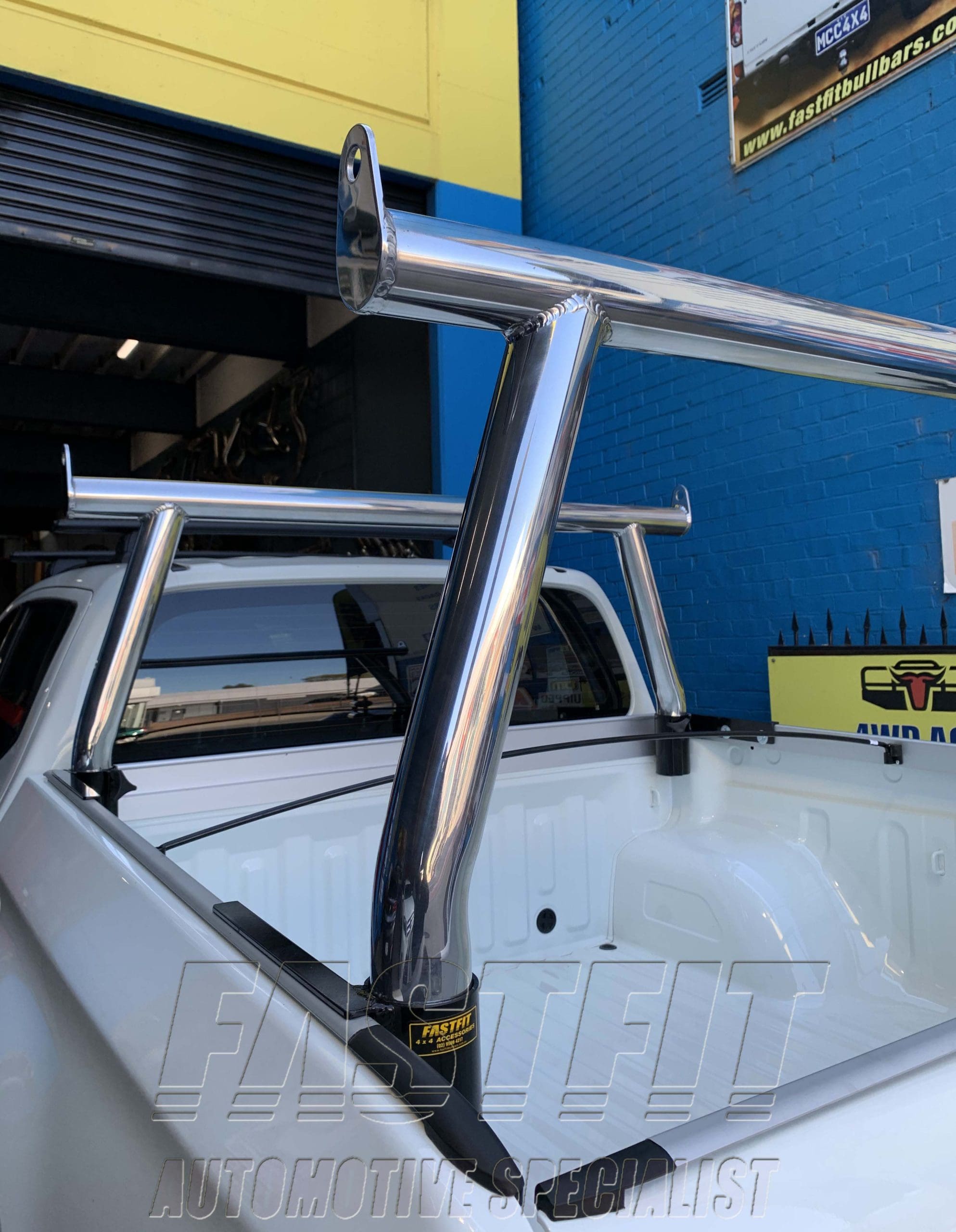 2MITSUBISHIMRTRITONFRONT_REARROLLBARS