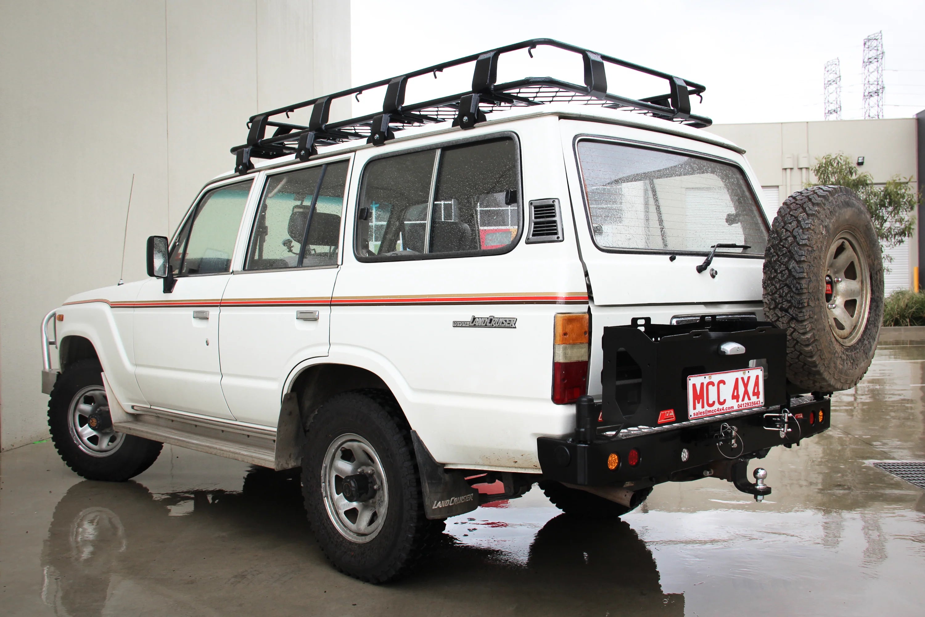 MCC 022-02 Rear Wheel Carrier Double Jerry Can Holder Package to suit Toyota Land Cruiser 60 series 1980-1990